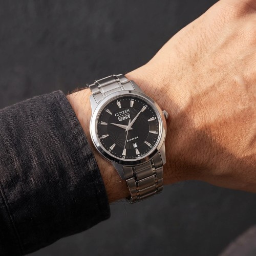 Montre Homme CITIZEN Dress Eco-Drive Cadran Blanc Bracelet Acier AW0100-86EC